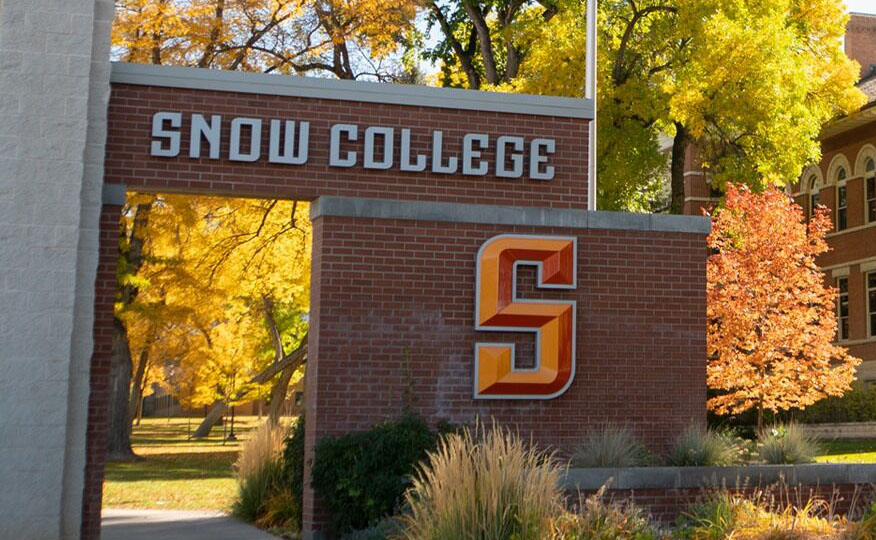 Snow College title sign with the orange 'S' fitted below the name..